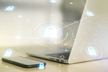 Poster - Double exposure of creative lock hologram with chip on laptop background. Information security concept