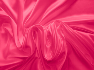 Beautiful elegant wavy fuchsia pink satin silk luxury cloth fabric texture, abstract background design. 