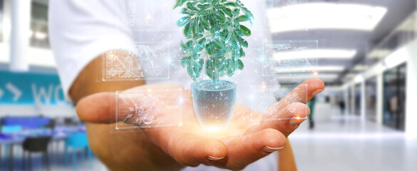Fototapete - Man holding and touching holographic projection of a plant with digital analysis 3D rendering