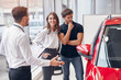© kegfire - Manager helping couple to choose car