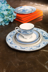 antique porcelain plate and cup on the table