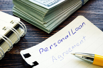 Personal loan agreement handwritten on notepad page.