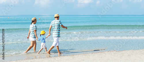 Happy family summer sea  beach vacation. Asia young people lifestyle travel enjoy fun and relax in holiday.