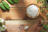 Fototapeta Mapy - Sea salt in wooden bowl and spoon 
