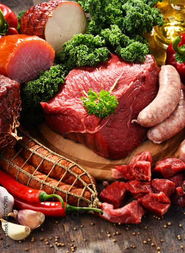 Photo Variety of meat products including ham and sausages