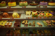 © Adrian Martinez ph - Shelving with different kind of cakes from a bakery