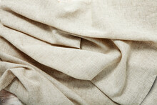 White Napkin Tablecloth . Wrinkled Fabric Background Top View.
