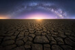 © Juan Lopez/ADDICTIVE STOCK - From below amazing scenery of arid ground under dark sky with Milky Way