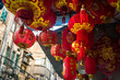 © Luis Gomez/ADDICTIVE STOCK - From below of traditional Chinese lanterns hanging on street of Xiamen city in China