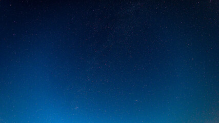 the starry night sky. a lot of stars, the milky way and the andromeda galaxy.