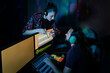 © Westend61 - Woman showing smart phone to man using computer in recording studio at home