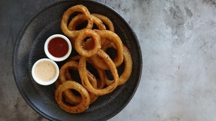 Wall Mural - Rotating Plate of Onion Rings