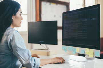 Programmer is coding and programming software. Software developer typing data code, working on project.