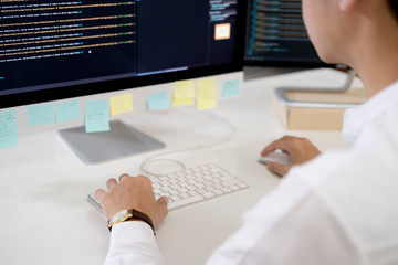 Programmer is coding and programming software. Software developer typing data code, working on project.