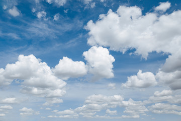 Wall Mural - white, fluffy clouds in blue sky. background from clouds