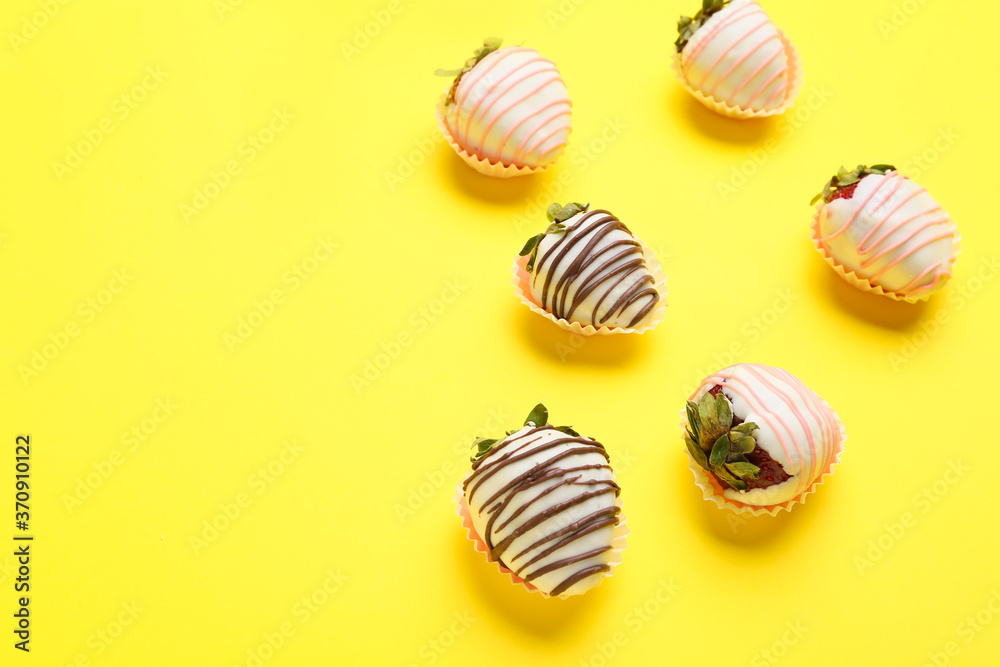 Tasty strawberry dipped in chocolate on color background