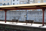 Fototapeta  - Benches on Public Covered Platform in French Railway Station 
