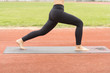 © AppSeek - Asian young women doing yoga, stretching for a healthy body, healthy body at the outdoor sports stadium.