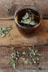 Poster - Useful tea with herbs on the table