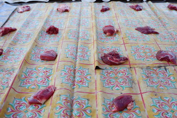 Wall Mural - Fresh red beef is cut into small pieces to celebrate the Muslim holiday, Eid al-Adha