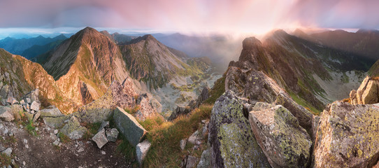 Wall Mural - Sunset in High Tatras mountains national park in Slovakia. Scenic image of mountains. The sunrise over Carpathian mountains. Wonderful landscape. Picturesque view of nature. Amazing natural Background