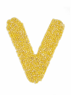 Letter V of the English alphabet made from millet on an isolated background.