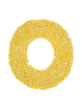 Letter O of the English alphabet made from millet on an isolated background.