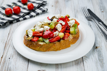 Canvas Print - bruschetta with tomatoes, cucumbers and cheese