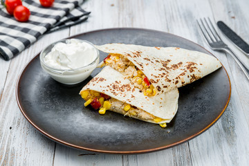 Wall Mural - Mexican Quesadilla with chicken on white wooden table