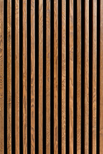 Texture Of Wood Lath Wall Background. Seamless Pattern Of Modern Wall Paneling With Vertical Wooden Slats For Background