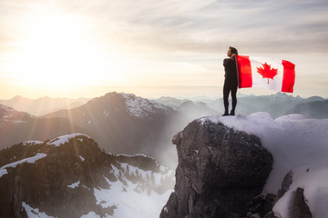 Wall Mural - Epic Adventurous Extreme Composite of Girl Holding a Canadian Flag on top of a Mountain. Landscape Background from British Columbia, Canada. Concept: Explore, Hike, Adventure, Lifestyle