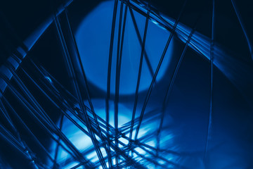 Poster - Beautiful optical fiber colored  line bokeh on a dark background.