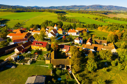 autumnal aerial landscape of czech village cakov with church of saint leonard in autumn day