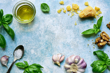 Wall Mural - Fresh ingredients for making traditional italian pesto sauce from basil and cheese. Top view with copy space.