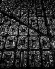 Wall Mural - Aerial view of typical buildings of Barcelona cityscape from helicopter. in black and white. fine art