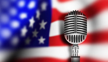 Microphone On The Background Of The Usa Flag