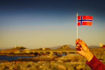 Wall Mural - Norwegian flag against Atlantic Road, Norway