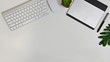 Stylish office table desk. Workspace with pen tablet, mouse and keyboard on white background, Top view.