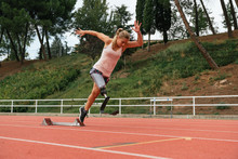 Runner With An Artificial Leg In A Starting Position