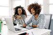 © Santi Nunez/Stocksy - Curly haired man working with a graphic tablet while curly haire