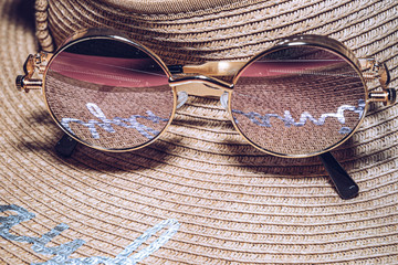 Vacation concept. Reflection in retro style mirror sunglasses. Summer concept.