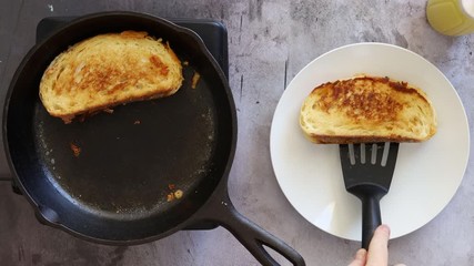 Wall Mural - Cooking a Grilled Cheese Sandwich