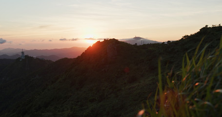 Wall Mural - Sunset sunlight on mountain view