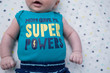 © Tamara Sales  - mom gave me super powers cute baby photo in crib