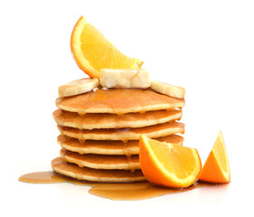 Wall Mural - Stack of pancakes with fresh orange and banana slice on white