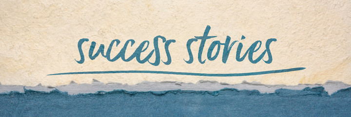 success stories inspirational typography - handwriting on a handmade paper, career, business or personal development concept, web banner