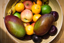 Healthy Selection Of Fruit In A Bowl On A Kitchen Table