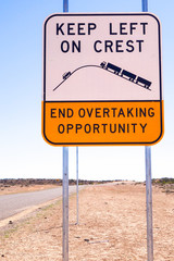 Wall Mural - Keep left on crests: End overtaking opportunity sign in outback Australia