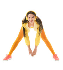 Wall Mural - Young woman doing aerobics on white background