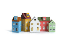 Wood Miniature Multicolor Houses Isolated On White.